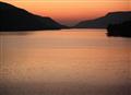 The Scenic Beauty of the Lake at Sunset..
